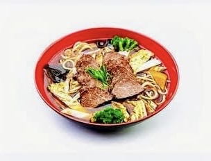 Noodle soup served in a red bowl